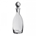 Corinne Decanter with Stopper 12 1/4\ Color 	Clear
Capacity 	1½ pint / 850ml
Dimensions 	12¼\ / 31cm (height with stopper)
Material 	Handmade Glass
Pattern 	Corinne